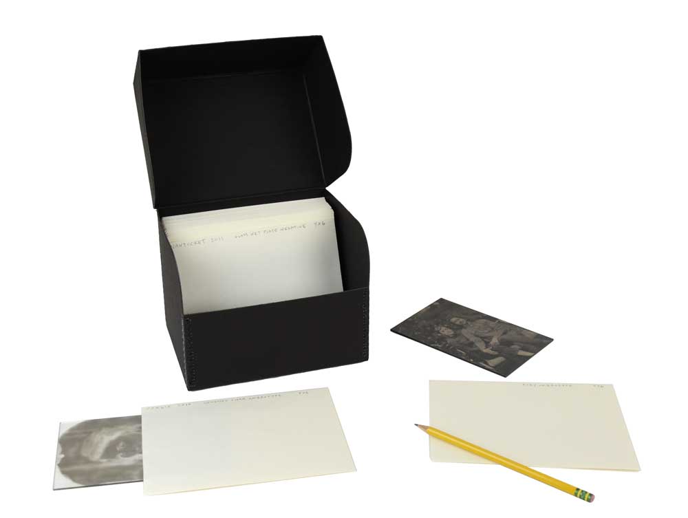 5 x 7 Open End Envelopes storing negatives and prints in an archival hinged lid box