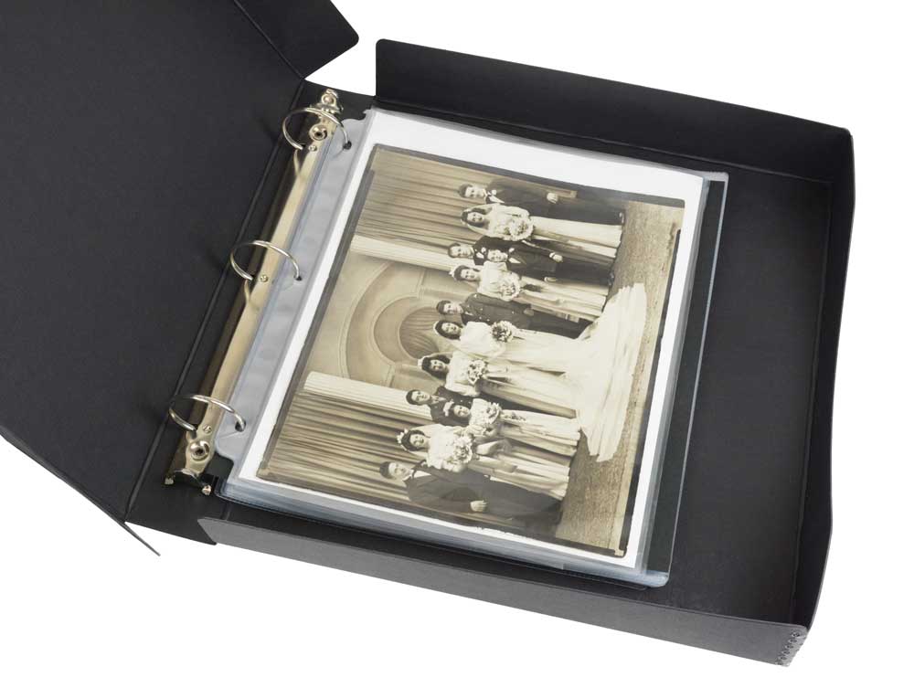 Open black Binder-In-A-Box combines a 3-ring binder & box made from acid-free materials for preserving photos and documents.
