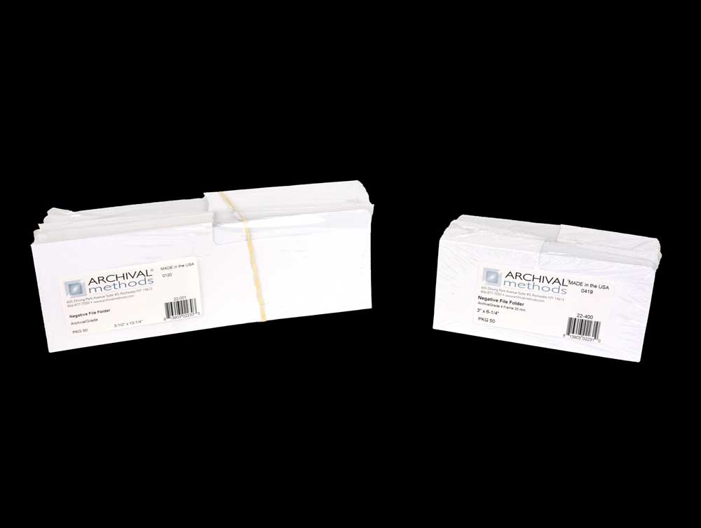 Acid-free archival file folders for organizing and storing film negatives, offering long-term protection against deterioration.