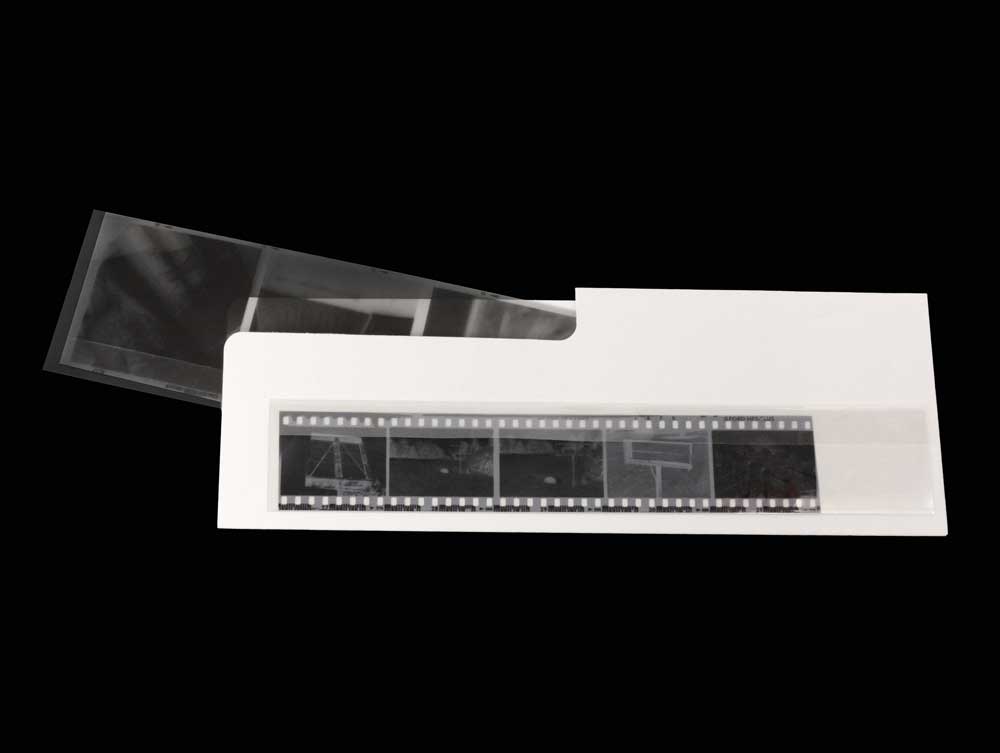 Acid-free archival file folders for organizing and storing film negatives, offering long-term protection against deterioration.