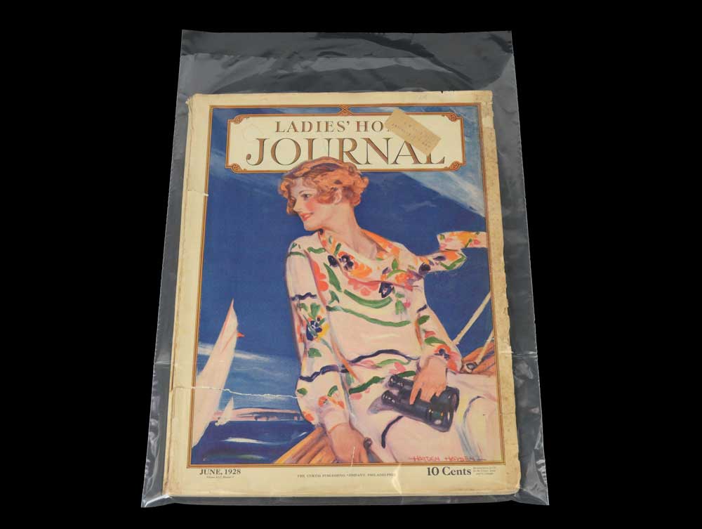 Polyethylene bag storing a vintage ladies homw journal magazine