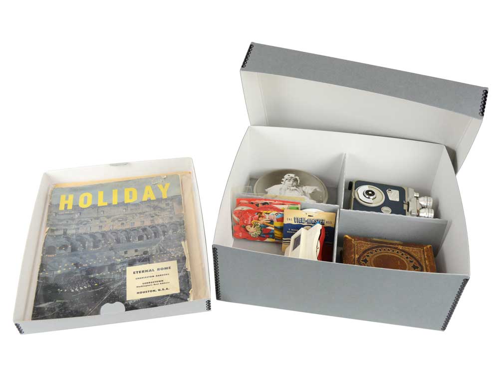 Archival Storage Kit with a short gray metal edge box, four-compartment divider, and top tray for preservation of heirlooms, photos, and documents.