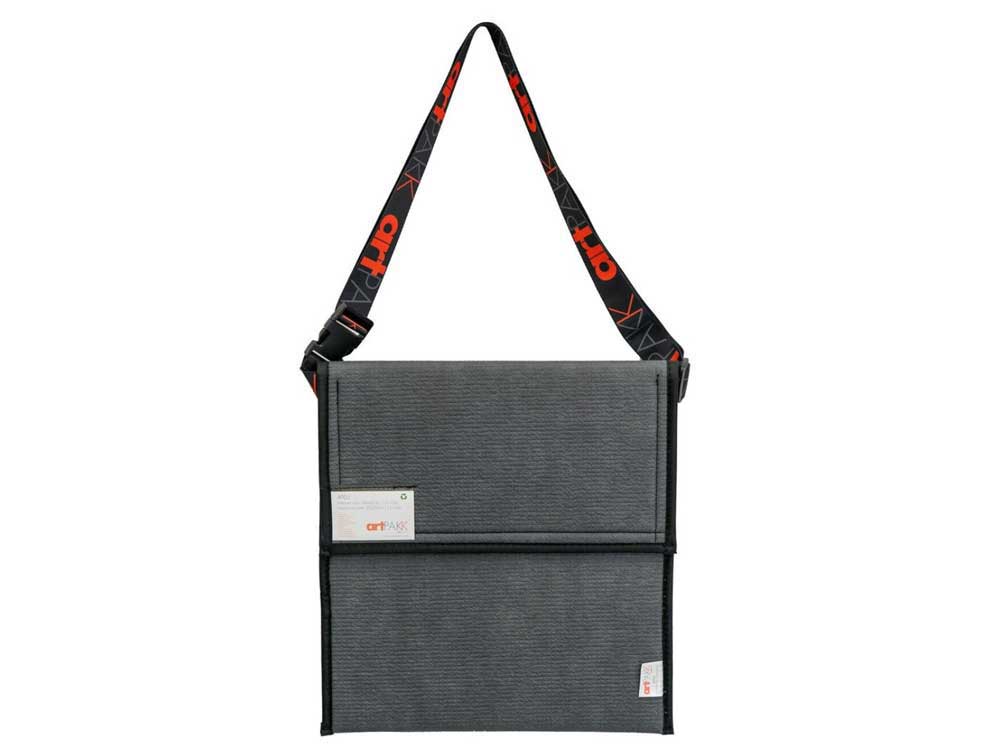 Adjustable Art Strap shown being used with an ArtPakk reusable art bag