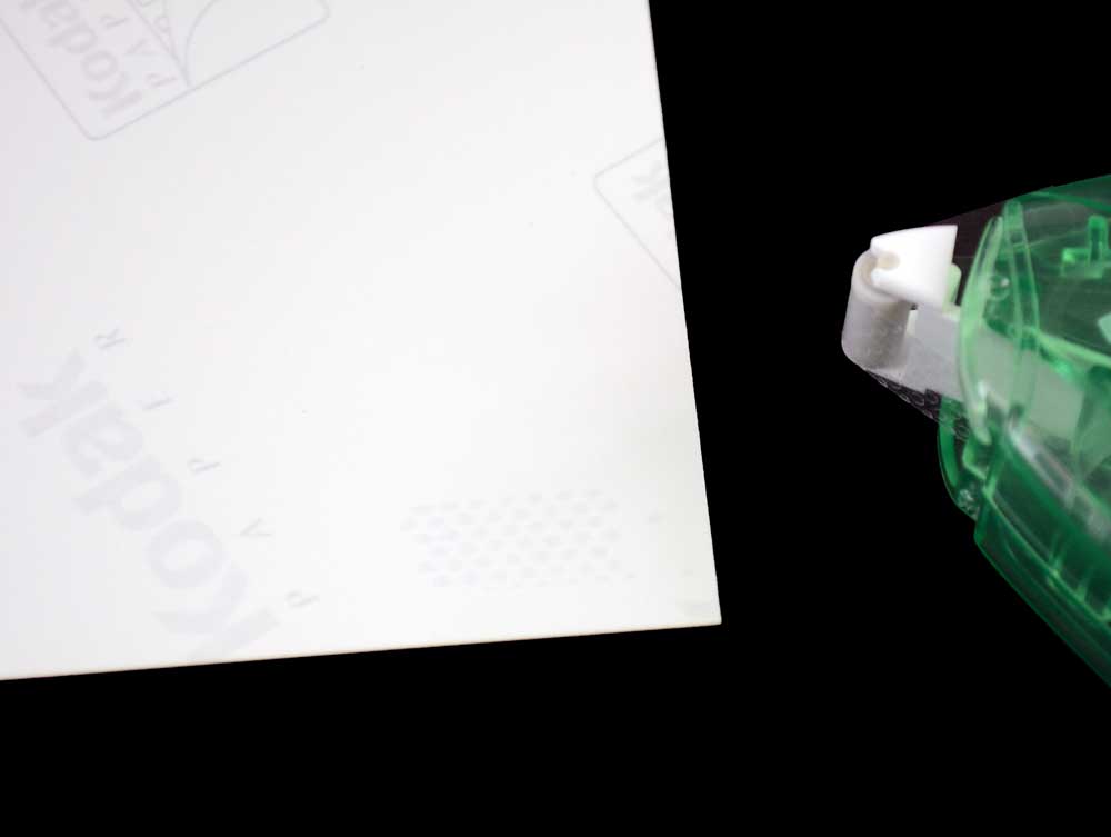 E-Z Dots are an archival double-sided adhesive that can be used to attach photos to album pages