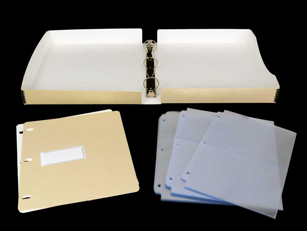 Open Tan Binder-in-Box Kit with archival binder, photo storage pages, and adhesive label, designed for long-term preservation of prints. 