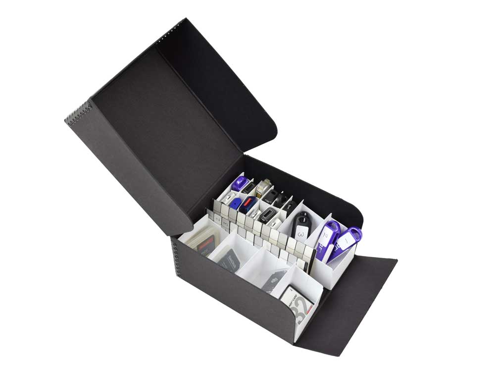 USB/Memory Card Storage Kit with acid-free archival box, indexing card, and labels, designed to organize and protect digital storage devices.