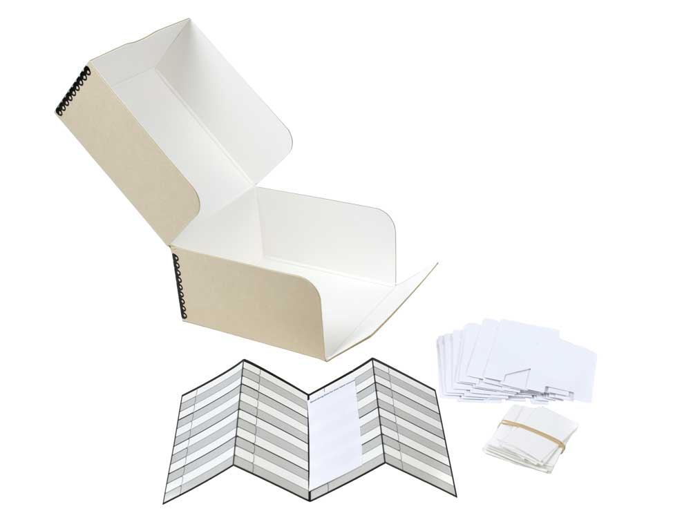 USB/Memory Card Storage Kit with acid-free archival box, indexing card, and labels, designed to organize and protect digital storage devices.