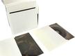 Prints and negatives stored in archival folders inside hinged lid metal edge box thumbnail